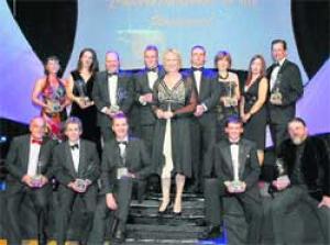 JOY OF WINNING: Award winners at last night's Daily Echo-backed Dorset Business Awards with Sally Taylor. Picture: Seeker Photography.com