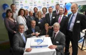 BEGINNING: Peter Scott, chief executive of Dorset Business (front right), Daily Echo editor Neal Butterworth  (front left) and representatives from all of the sponsors cut a special cake to officially launch the Dorset Business Awards 2008